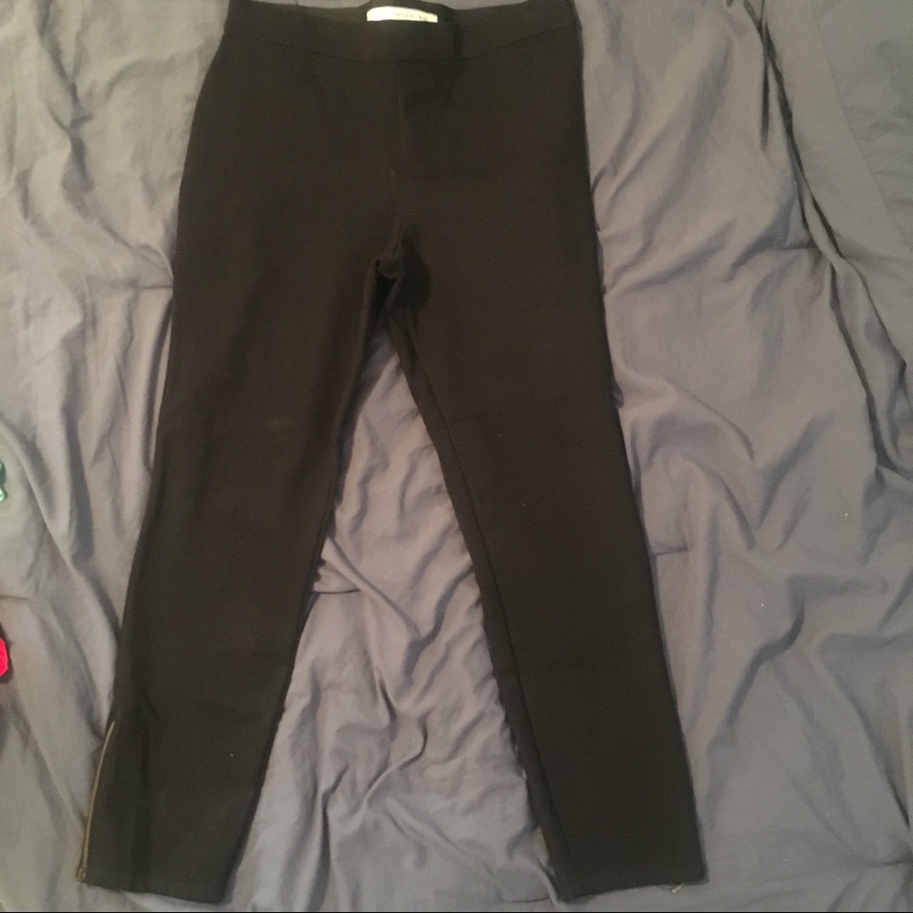 Black max studio ankle pants with zipper detail